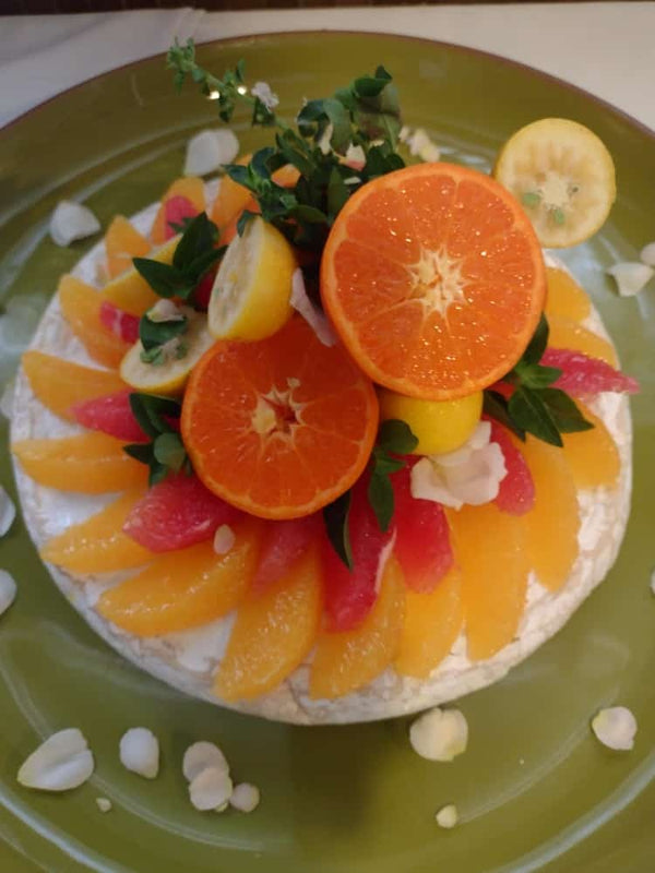 Queijo brie com geléia de tangerina e frutas cítricas