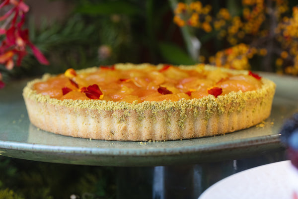 Crostata de damasco com ricota, laranja e flor de laranjeira