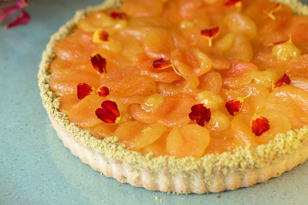 Crostata de damasco com ricota, laranja e flor de laranjeira