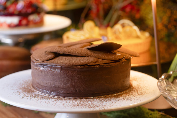 Bolo de cacau com laranja e damasco