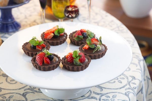Tarteletes de chocolate com ganache e frutas vermelhas